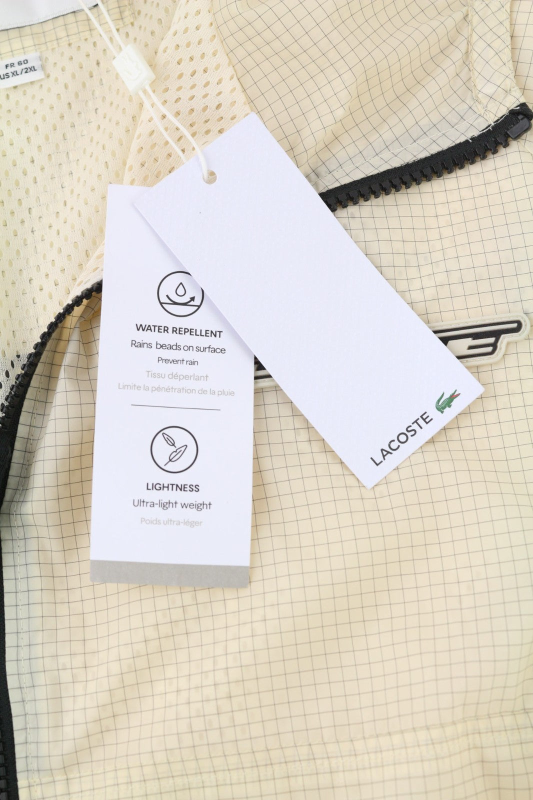 LACOSTE vyriška striukė XL/2XL smėlio spalvos su gobtuvu ir vandeniui atspariu languotu lengvu paltu 