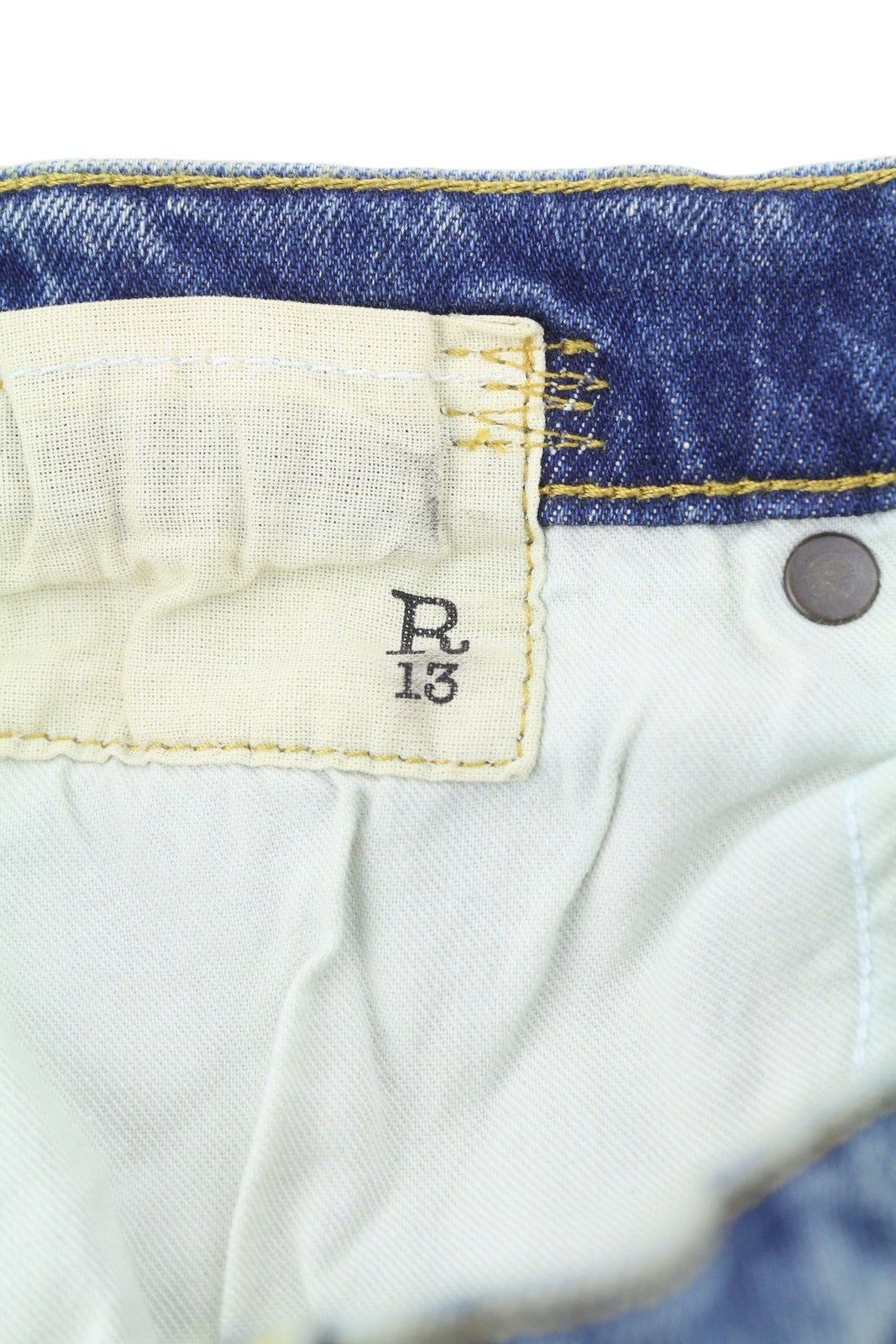 R13 Jane moteriški džinsai 28 Kelly tamprūs, platėjančios klešnės, blukintos mėlynos spalvos su užtrauktuku PF25 RPRP645 