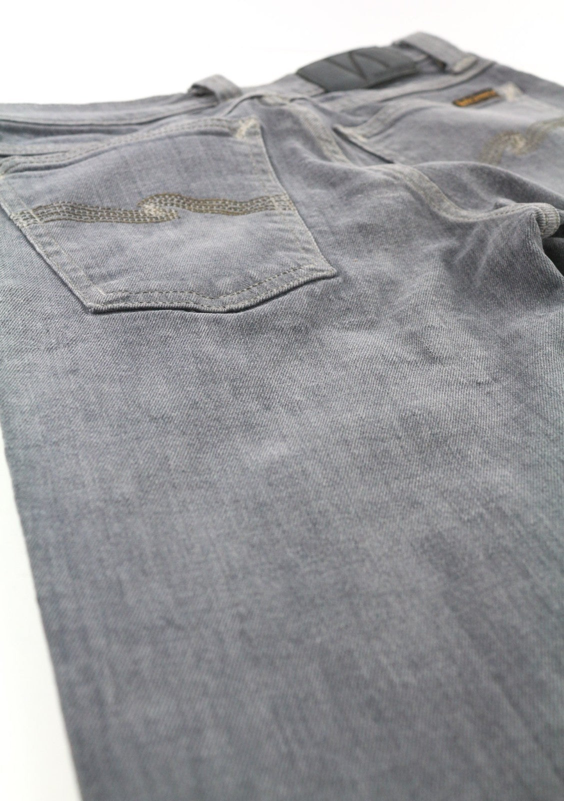 NUDIE JEANS aptempti ilgi moteriški džinsai W26/L34 tamsiai pilki, ploni, ekologiški 