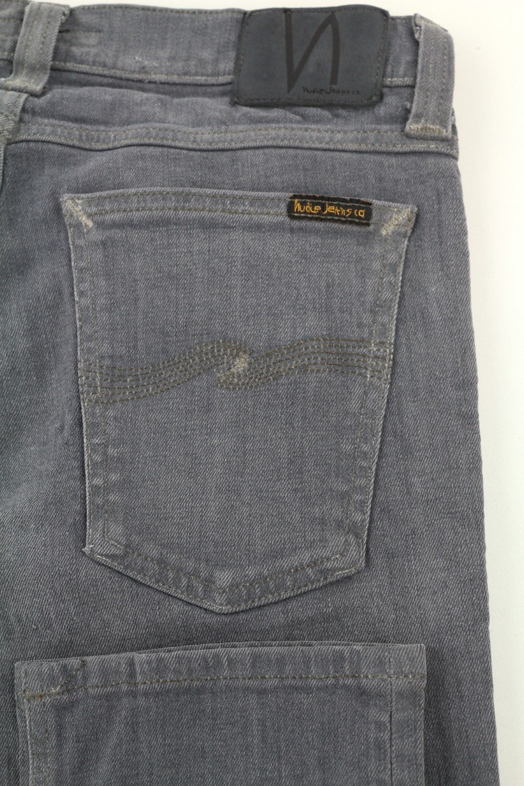 NUDIE JEANS vyriški aptempti ilgi džinsai W31/L34 tamsiai pilki, ploni, su užtrauktuku 