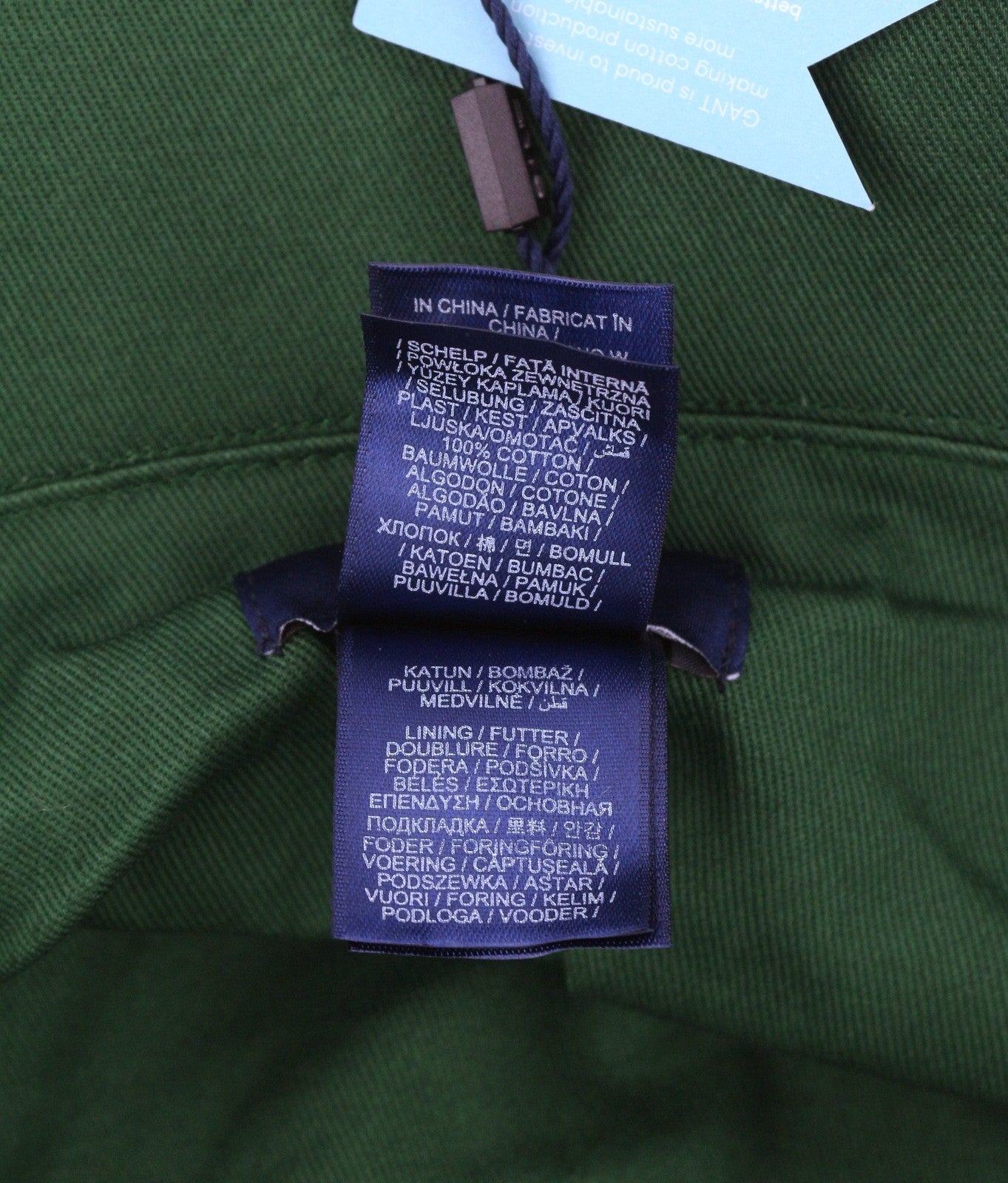 GANT virvelinė kibiro formos vyriška kepurė su L/XL dydžio daugiaspalve medvilnine priekine logotipu ir pamušalu. 