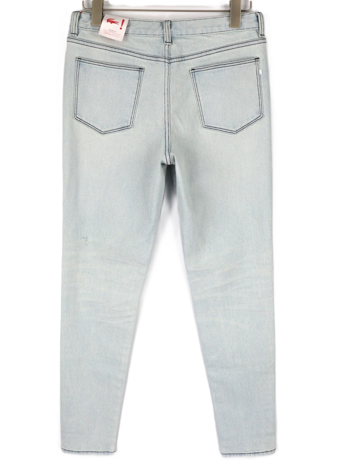 LACOSTE HF2897 moteriški W30 mėlyni skalbtos medvilnės tamprūs ploni siaurėjantys džinsai 