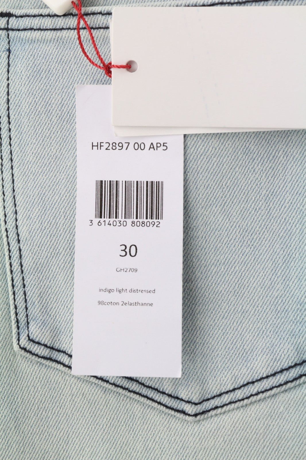 LACOSTE HF2897 moteriški W30 mėlyni skalbtos medvilnės tamprūs ploni siaurėjantys džinsai 