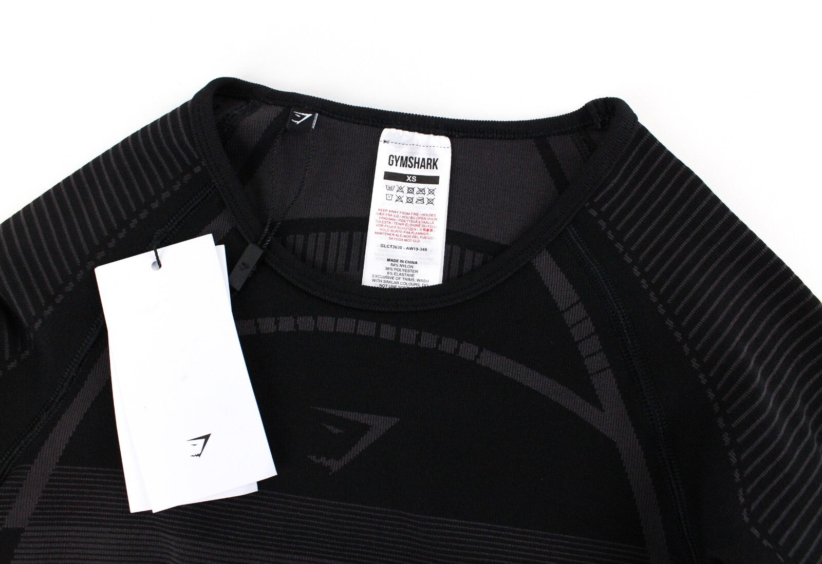 GYMSHARK Geo moteriški marškinėliai XS dydžio, juodi, ilgomis rankovėmis, trumpinti, tamprūs sportiniai marškinėliai 