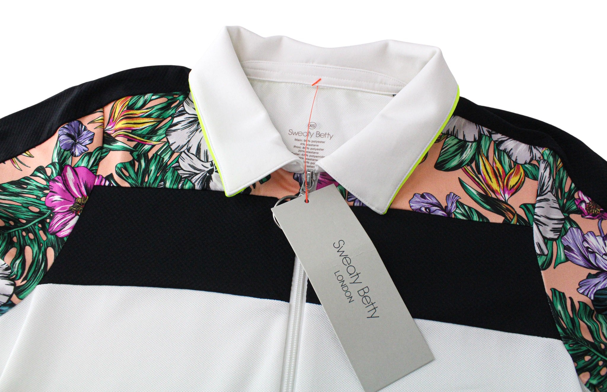 SWEATY BETTY Volley moteriška suknelė XS dydžio teniso suknelė, balta, gėlėta, tampri sportinė apranga 